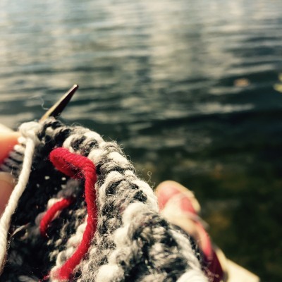 knitting on the dock of Lake Katherine at Riding Mountain National Park, Manitoba, Canada