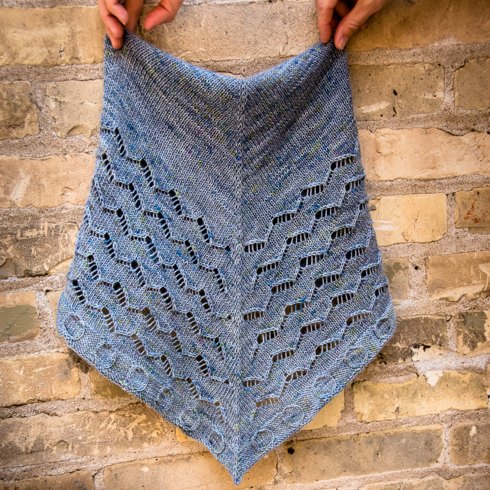 Street Art Cowl - A knitting pattern from Imagined Landscapes Designs. One skein project that looks like a shawl but wears like a cowl!