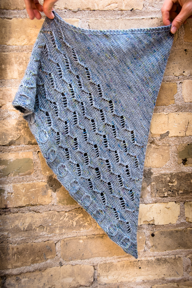 Street Art Cowl - A knitting pattern from Imagined Landscapes Designs. One skein project that looks like a shawl but wears like a cowl!