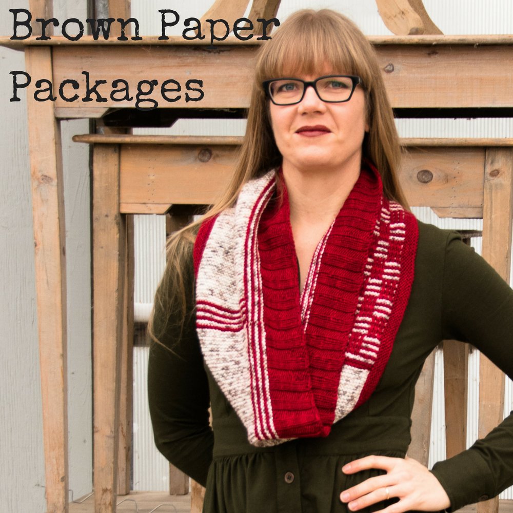 Brown Paper Packages Cowl - A knitting pattern for DK weight yarn featuring easy stripes and slipped stitches from Imagined Landscapes Designs. Three Irish Girls yarn in Springvale DK - Mister Heat Miser and Birch